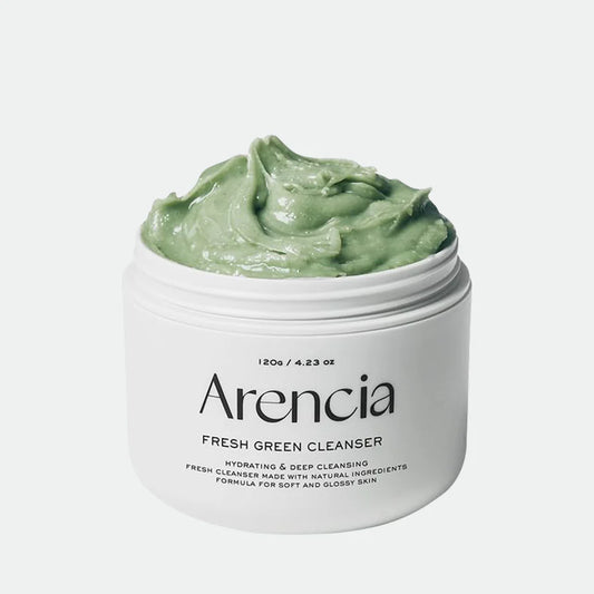 Tarro de limpiador facial Arencia Fresh Green Rice Mochi Cleanser abierto mostrando crema verde