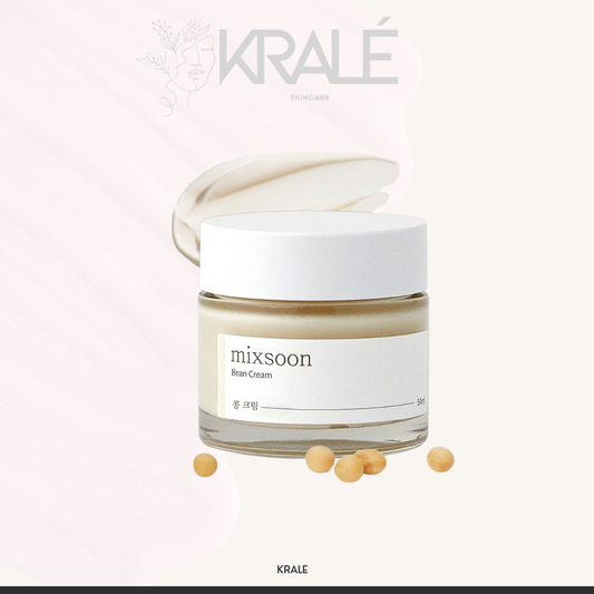 Tarro de crema hidratante mixsoon Bean Cream con tapa abierta y frijoles amarillos sobre fondo claro con logo KRALÉ